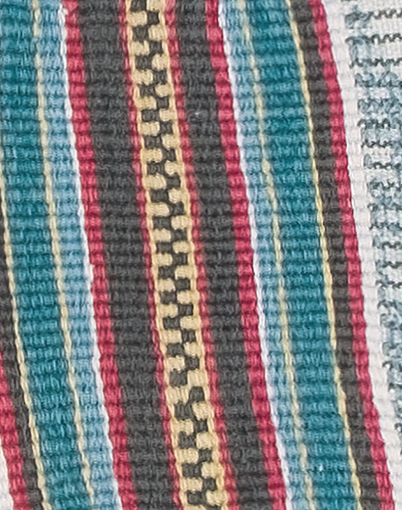 Textile detail in deep natural tones